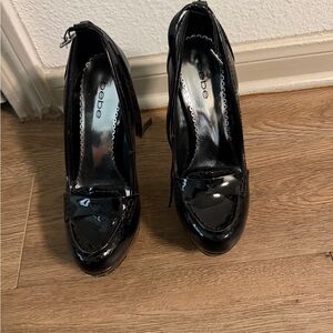 bebe Black Patent Loafer-Style Heels with Ankle Strap